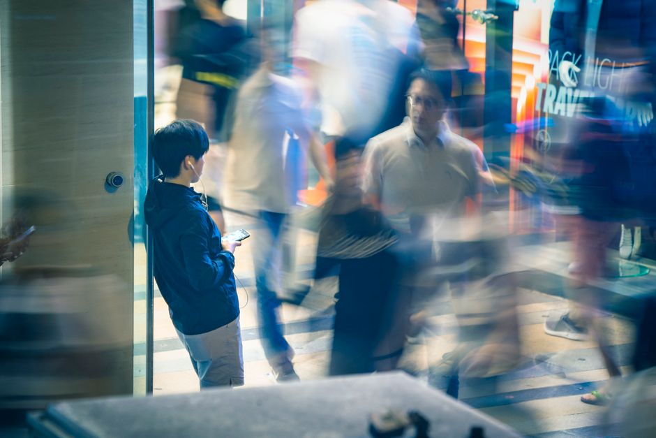 Traveler using smartphone in Hong Kong