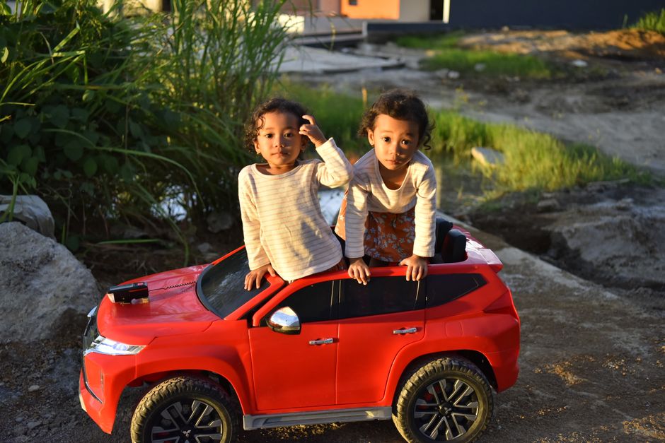 Happy family in rented SUV