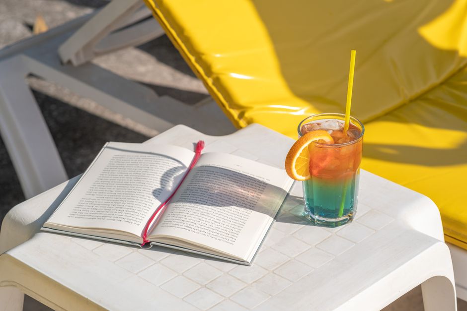 Tropical cocktail on beach table