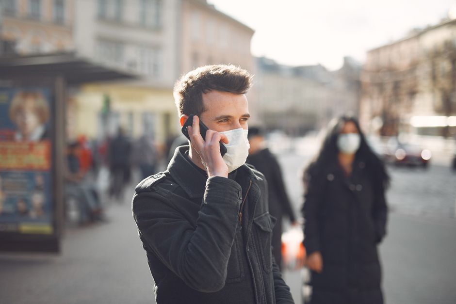 Traveler using phone in Prague street
