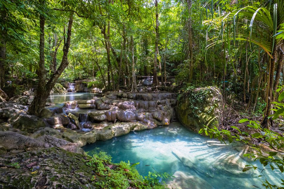 Erawan waterfall turquoise pool tropical jungle