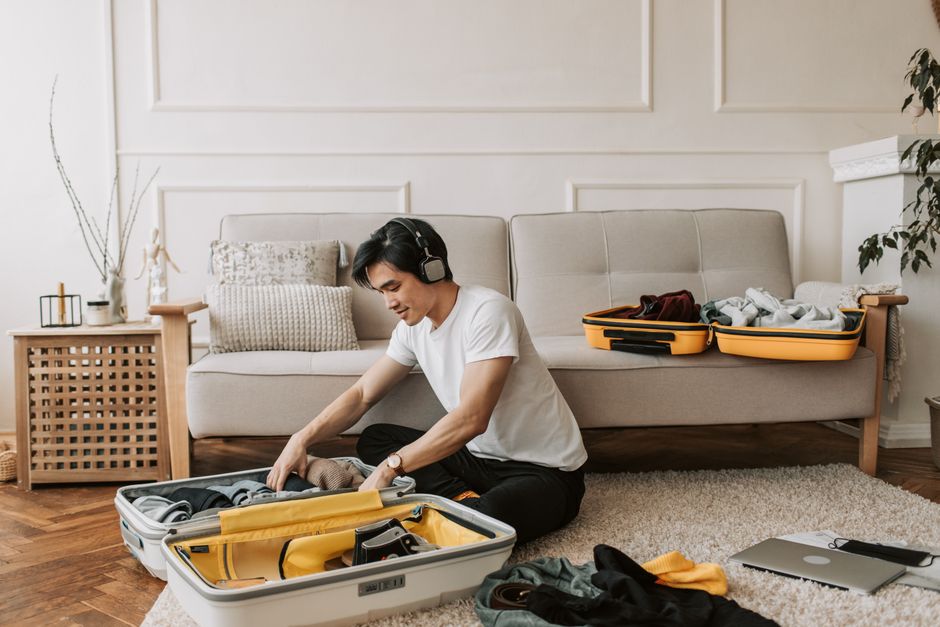 traveler packing suitcase