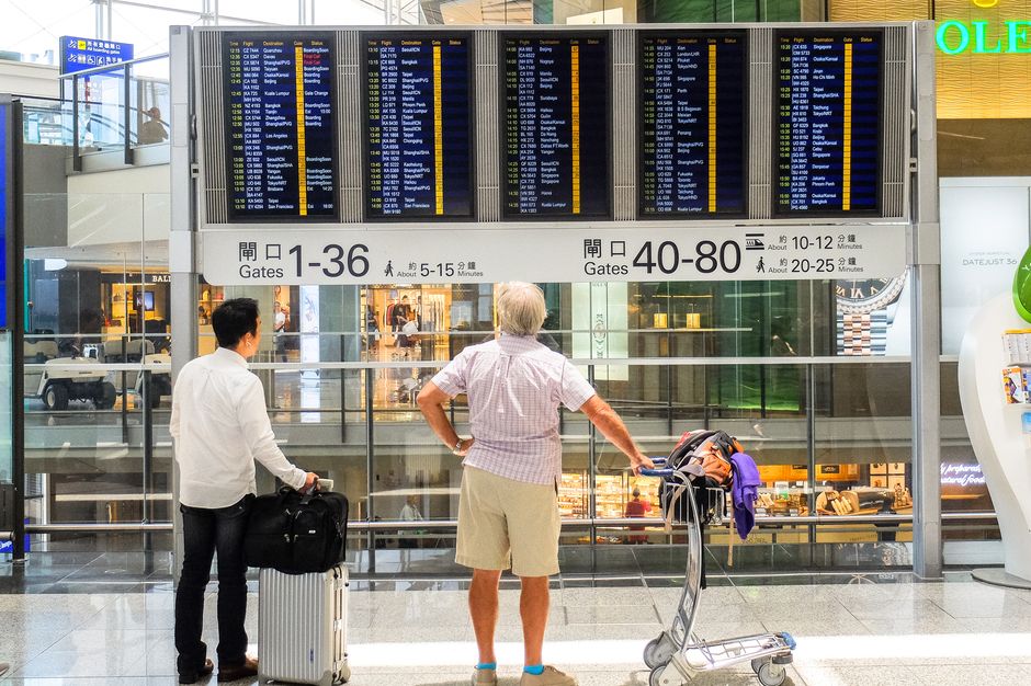 Tourist-holding-local-sim-card-at-airport