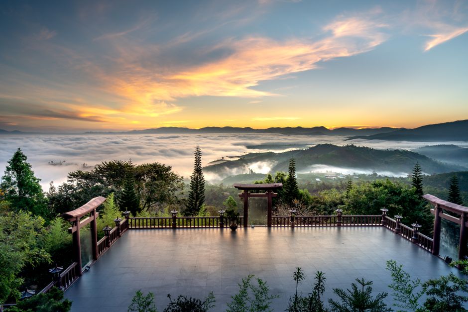 misty mountain temple sunrise