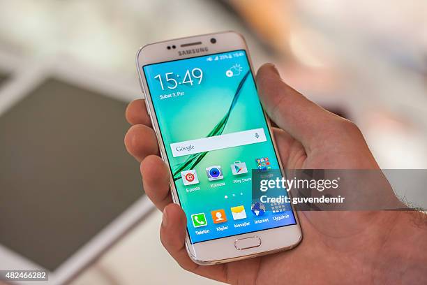 Samsung Galaxy smartphone in hand