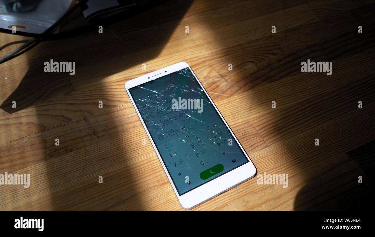Xiaomi smartphone on wooden surface